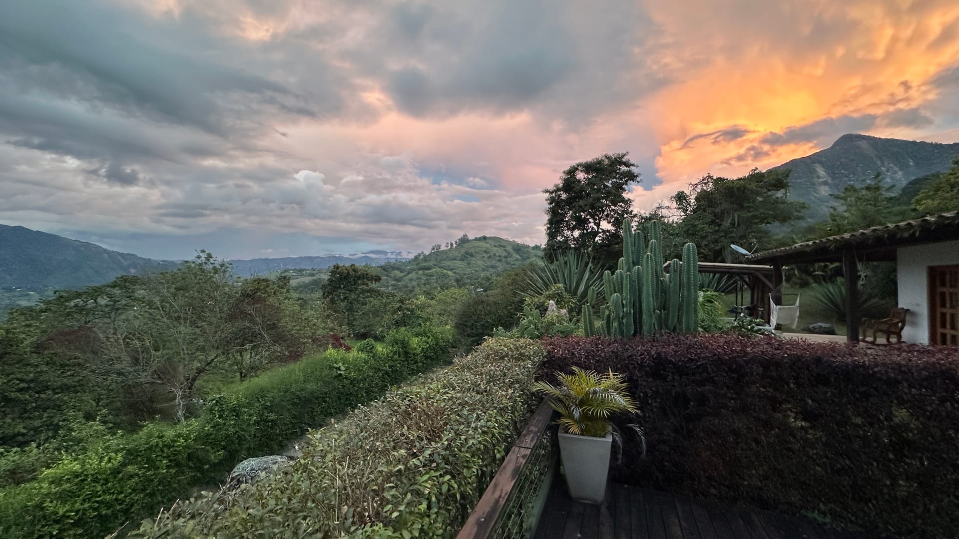 Patio terrace at sunset with panoramic Andean mountain views